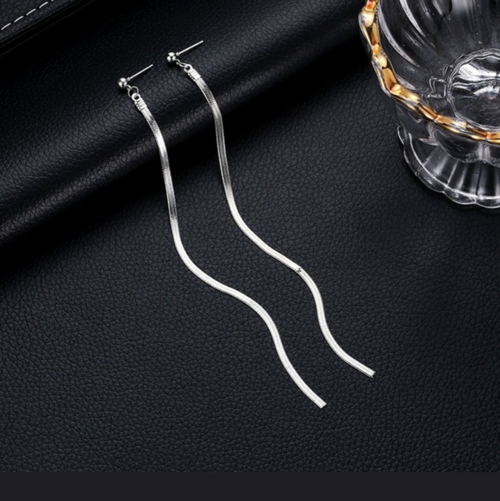 White gold tone tassel earrings